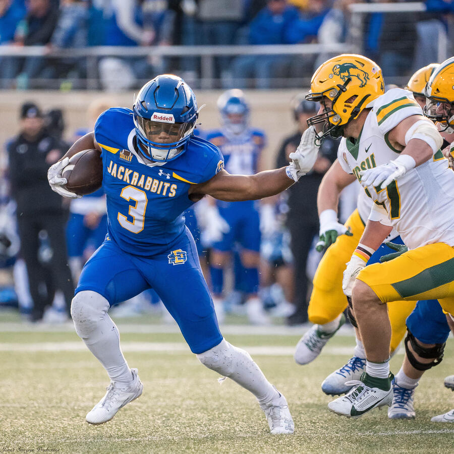 Amar Johnson stiff arm NDSU defender