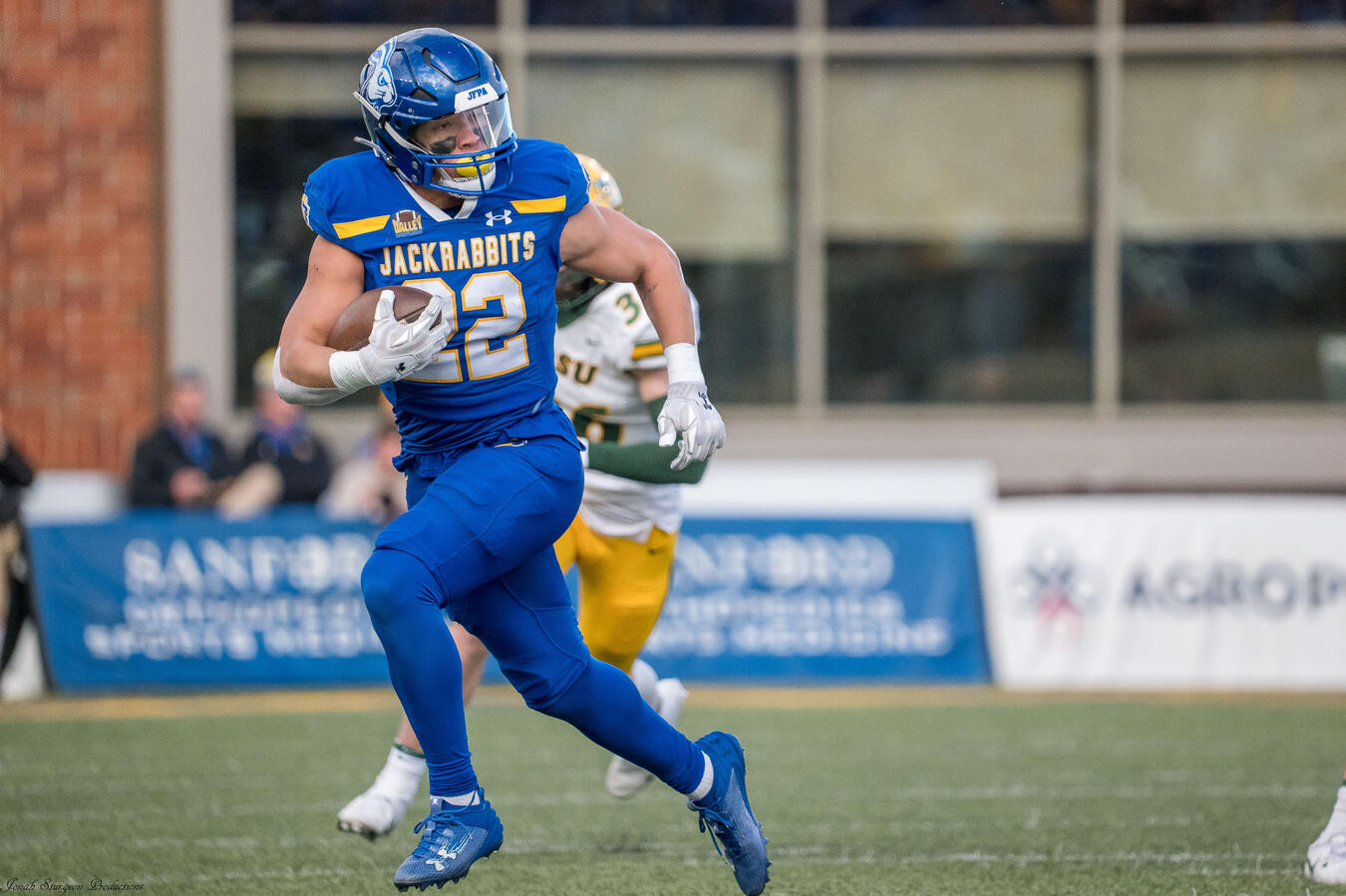 Isaiah Davis runs the ball against NDSU